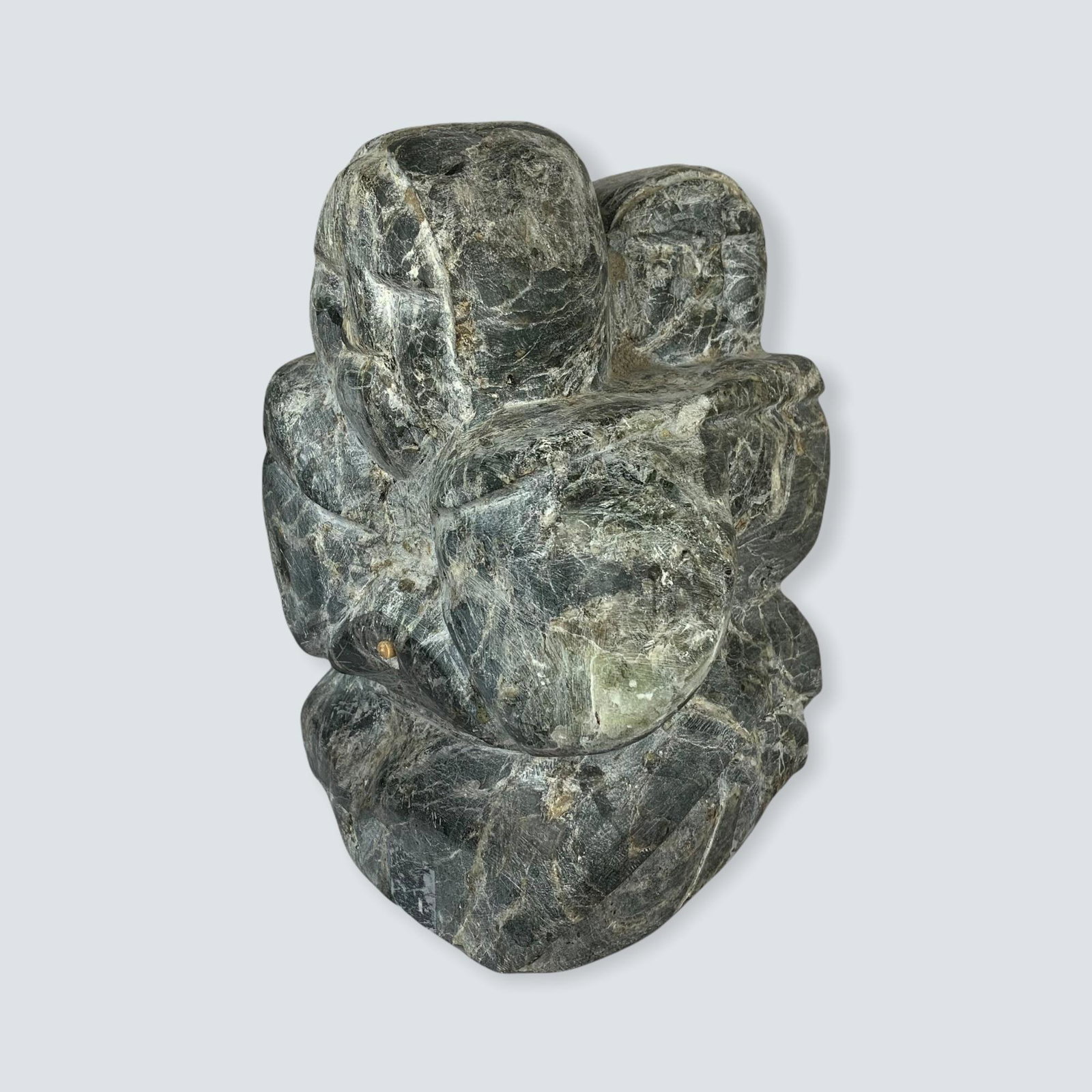 Heavy Inuit Carved Sculpture of Mother & Child. By: Very fine carved soapstone sculpture of Mother & Child. Carved by Thomas Akilak. 8 1/2 x 6 x 6 wide. Nice