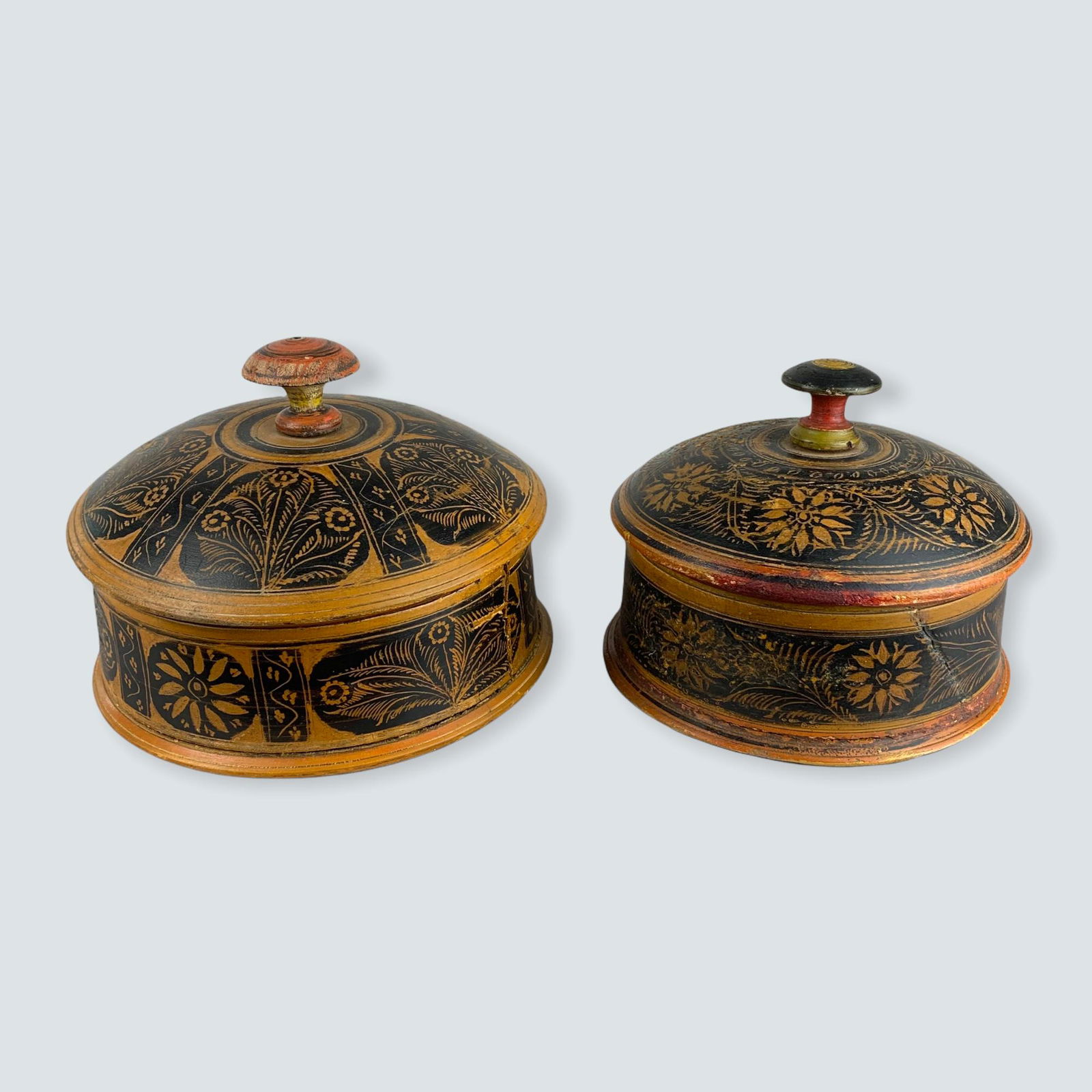 2 Antique Afghanistani Wooden Bowls. Early 1900â€™s: A pair of Afghanistan wooden containers with lids. One 8 and one 7. Each has a split in side