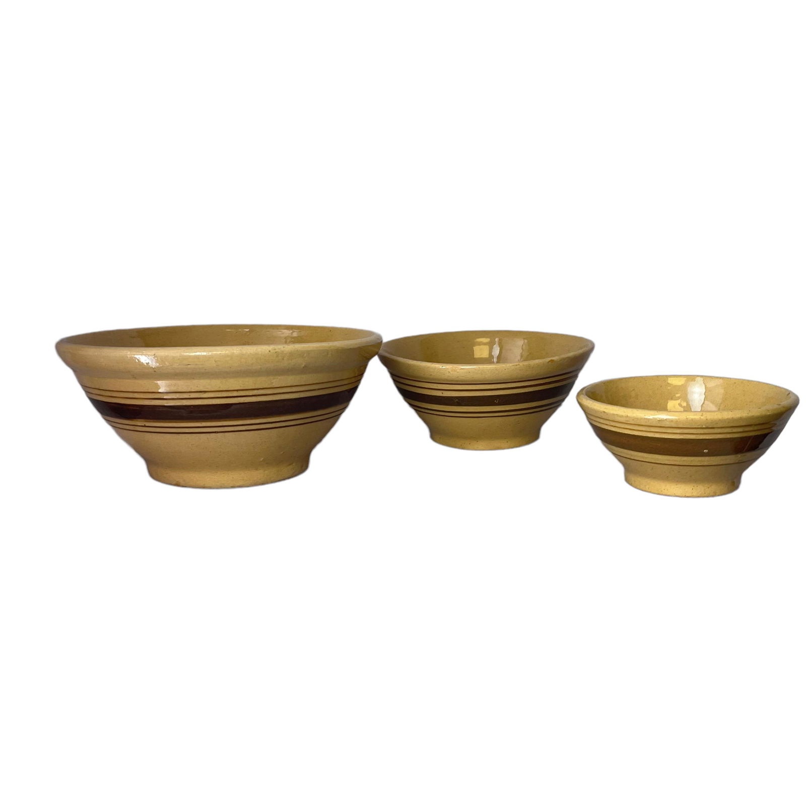 Nested Set of 3 Matching Yellowware Bowls: A very nice clean set of three matching yellow ware nesting bowls. 10 - 8 - 6 inch. A super set with no cracks - chips - repairs - or crazing.