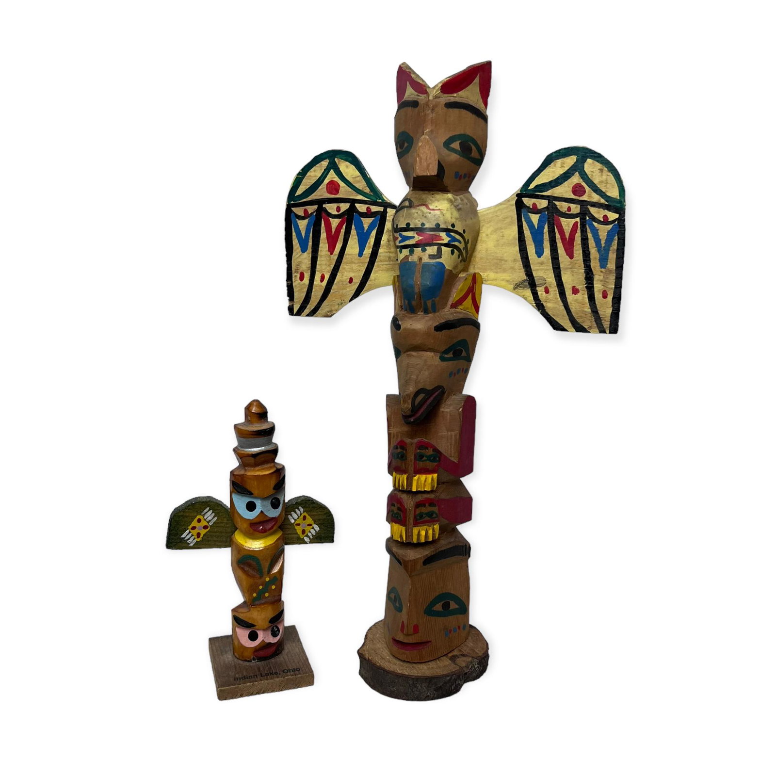 Pair of Wooden Totem Poles: 2 20th century northwest wood totem poles. a 10 1/2 inch and a 5 inch. Both in excellent condition