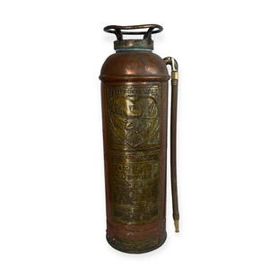 Early Elkhart Brass Mfg Co Fire Extinguisher: A very nice brass fire extinguisher made by Elkhart Brass Mfg Co featuring the Elkhart Elk Logo at center. A very nice piece of Industrial Americana. Measures approx 23 inches tall. Some age expected