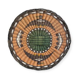 Hopi Thunderbird Wicker Plaque/Tray: A rare and colorful Hopi wicker plaque/tray. Ornate with thunderbirds, and various colors. Measures 12.5 inches in diameter. Some fading.