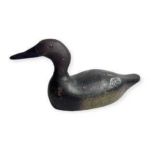 Quality Evans Decoy Company Decoy: Very nice duck decoy in original paint, attributed to Evans Decoy Company. Glass eyes, carved bill. 17 inches from end of tail to tip of bill. Slight paint loss, separation at neck, and couple inner