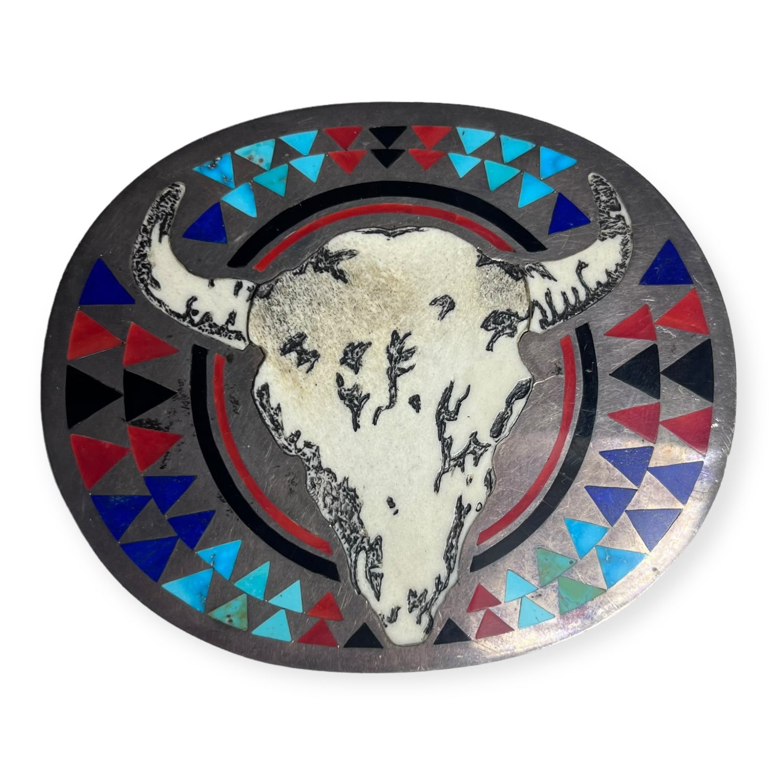 Fine HM Coonsis Inlaid Zuni Belt Buckle: With inlaid stone and bone, marked on back HM COONSIS. Very unique example. Measuring approx 4 x 3 1/4 inches.