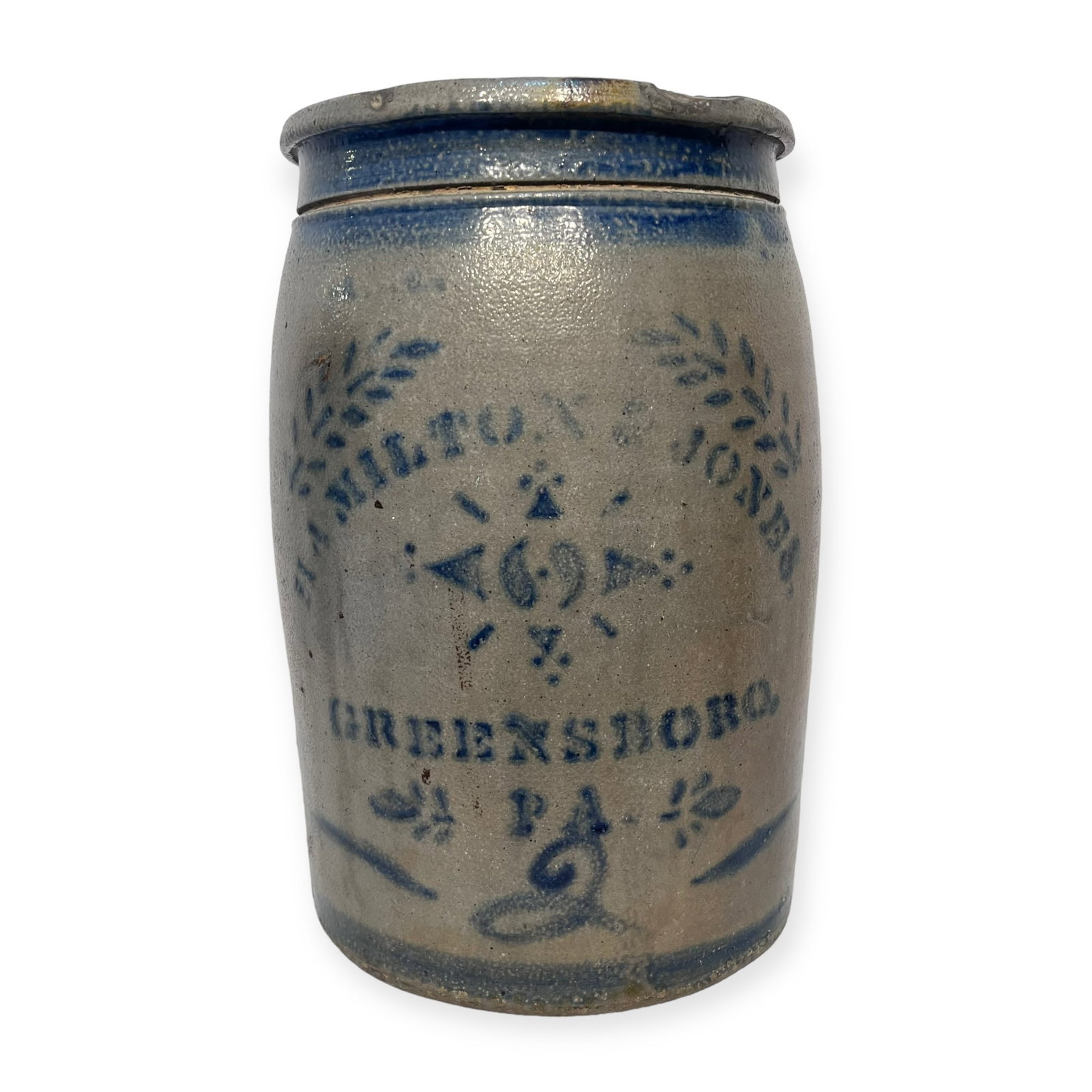 Stenciled Hamilton & Jones Jar: A 2 gallon stenciled jar, Hamilton & Jones. Greensboro PA. Nice condition with shallow chip to rim which is glazed over.