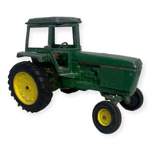 John Deere Ertl Diecast Toy Tractor: Some paint loss and sticker loss.