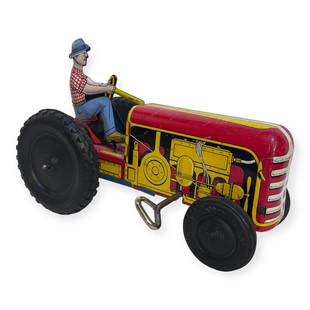 1940s Walt Reach Courtland Tin Litho Tractor: Tin, rubber, and plastic.