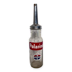 Standard Polarine 1 Quart Glass Bottle: 15 inches tall. One chip to bottom edge.