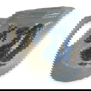 Blue & White Stoneware Dutch Boy & Girl Kissing Pitcher: Vintage Blue & white stoneware crockery Dutch boy and girl kissing 7 1/2 inch pitcher. Strong design and color. Excellent condition with one tiny flea bite at top rim.