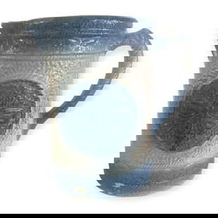 Blue & White Stoneware Butterfly Pitcher: Vintage Blue & White stoneware crockery Butterfly pitcher. Strong color. 8 1/2 inch. One shallow nick at base and one chip on top rim.