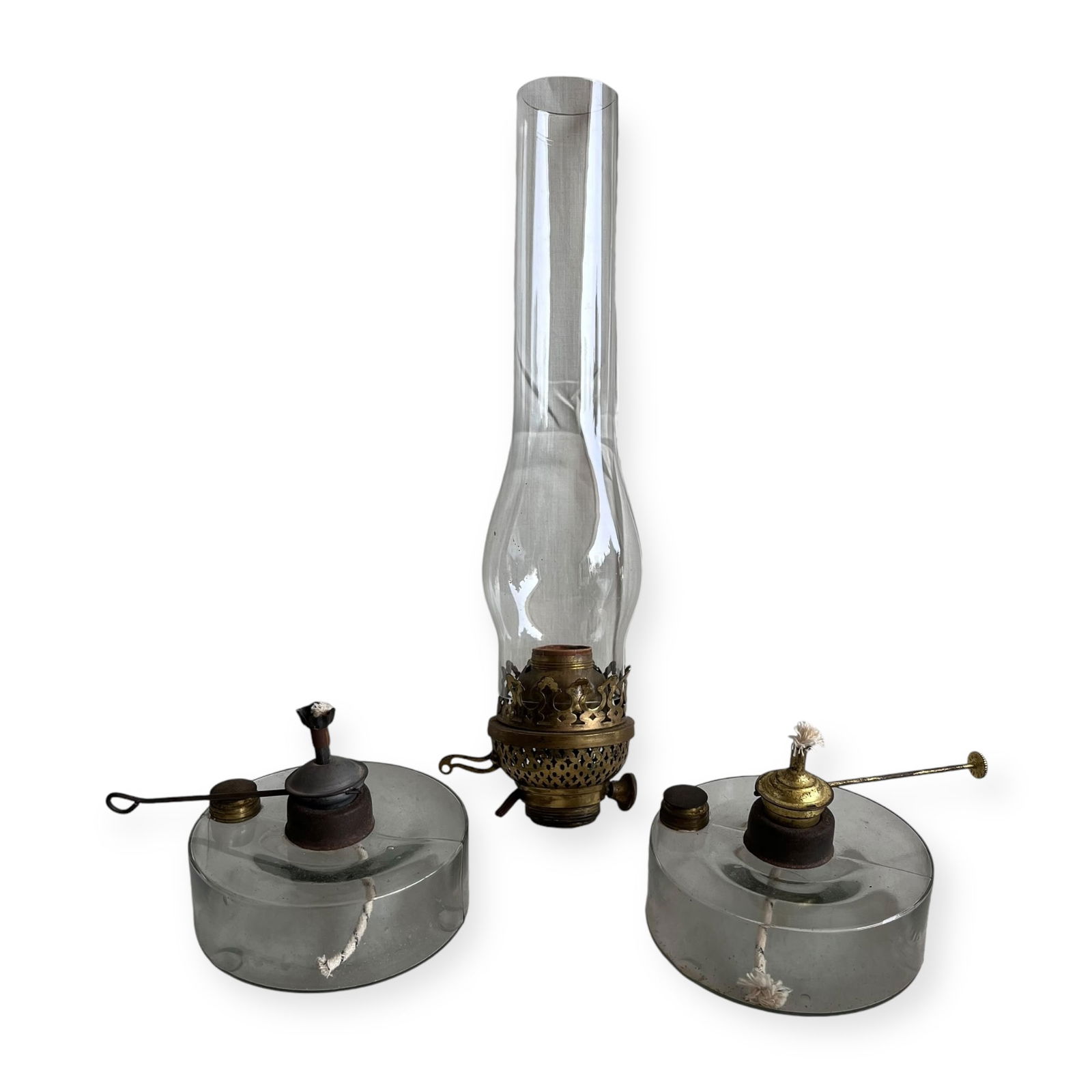 Group of Oil Lamp Parts: Including a pair of glass oil lamp bases, and a glass lamp with brass holder.