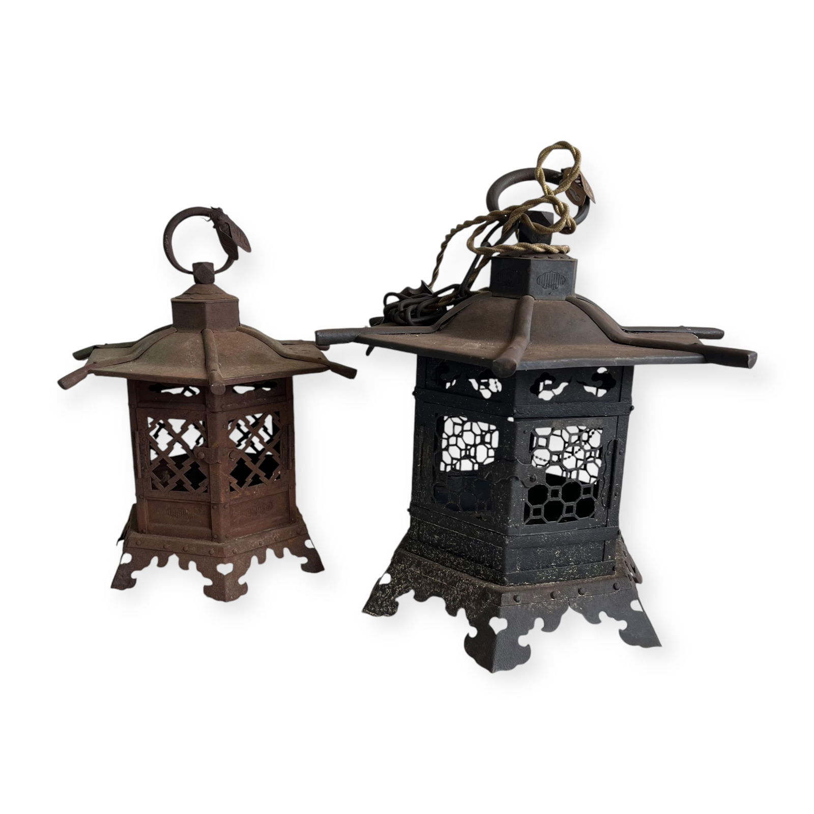 Pair of Japanese Iron Lanterns: Iron Lanterns, one measuring approx 12 inches tall the other approx 14 inches tall. Great art deco.