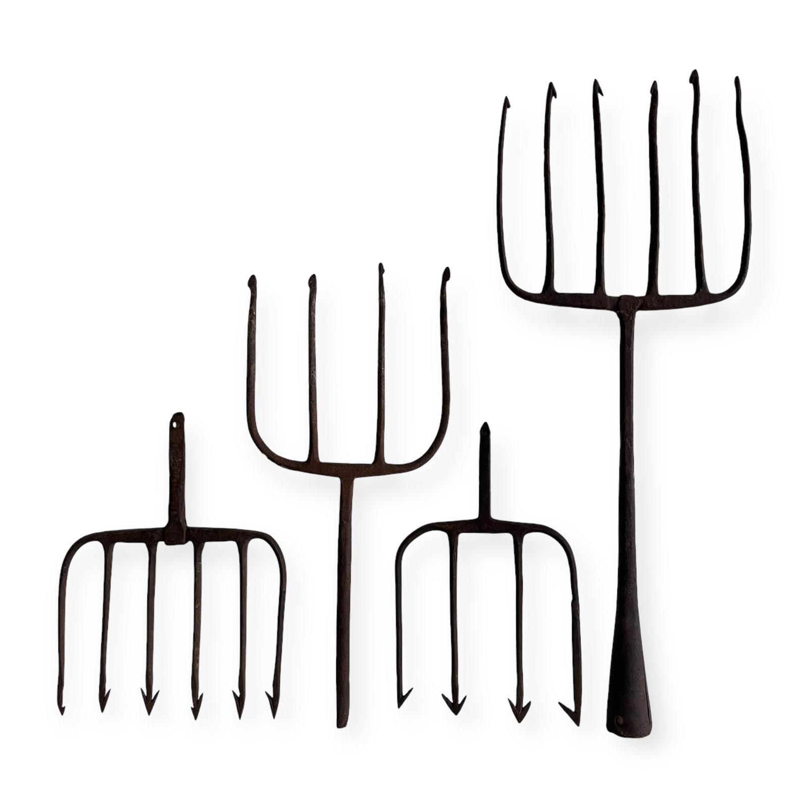 Group of 4 Iron Larger Fishing Spears: Measuring 23 inches in length to 11 inches.