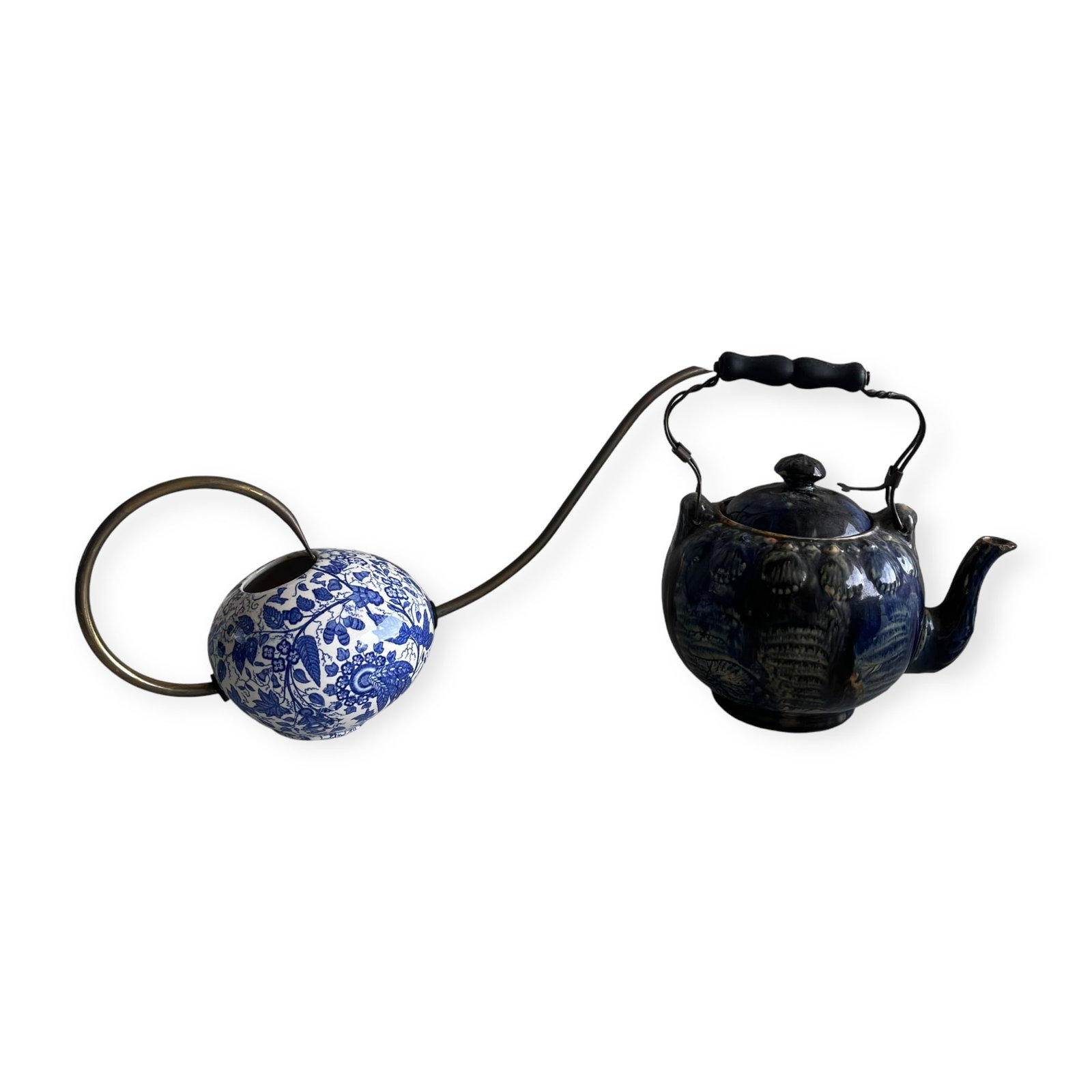Pair of Porcelain English Tea Pots: Both blue and white with handles. Good overall condition with some minor cracks.