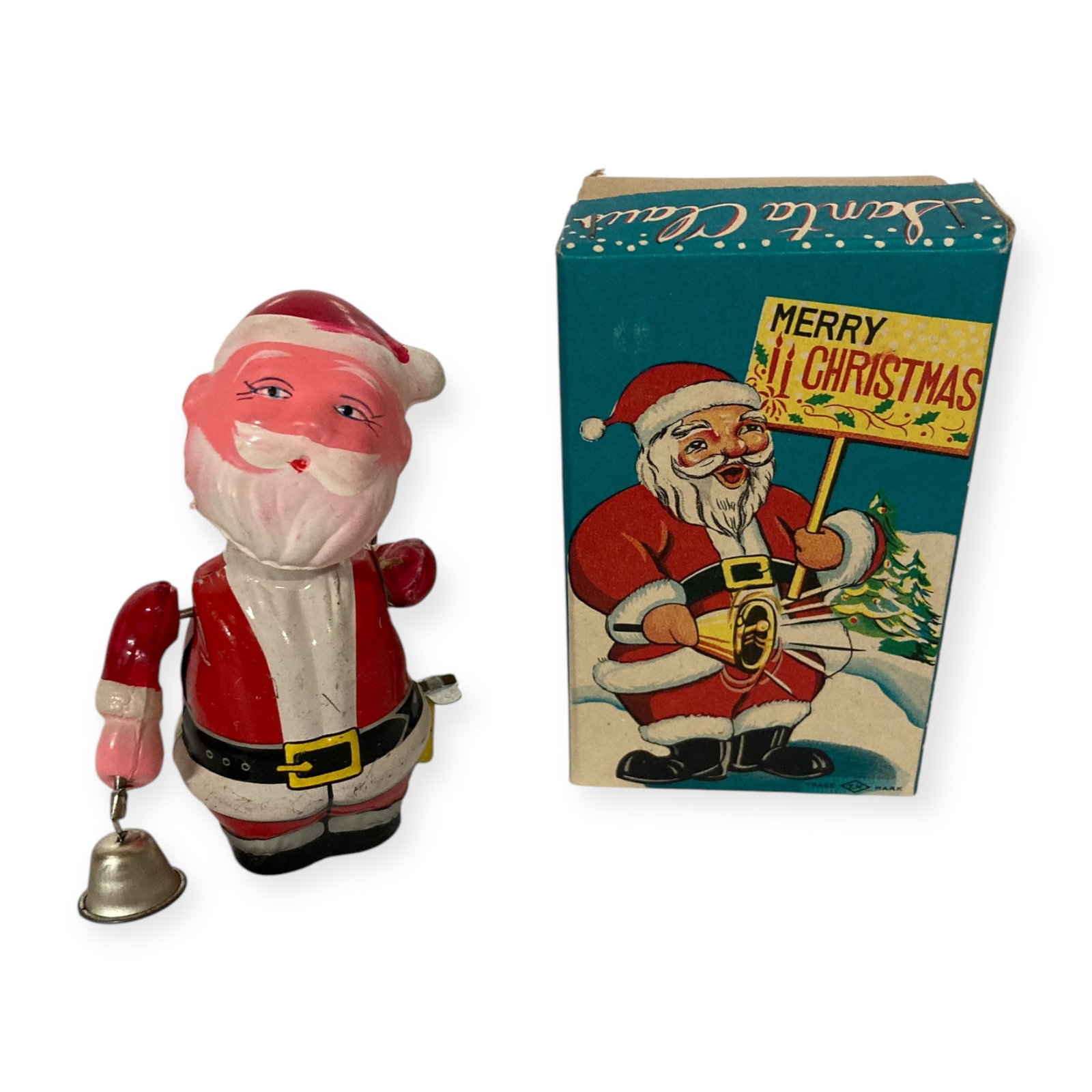 Vintage Tin Wind-Up Santa In Original Box: Vintage Wind-Up Tin Santa In Original Box. Santa is 5 inches. Winds up fine. Box is excellent. One of Santa's arms is loose but still attached, otherwise fine