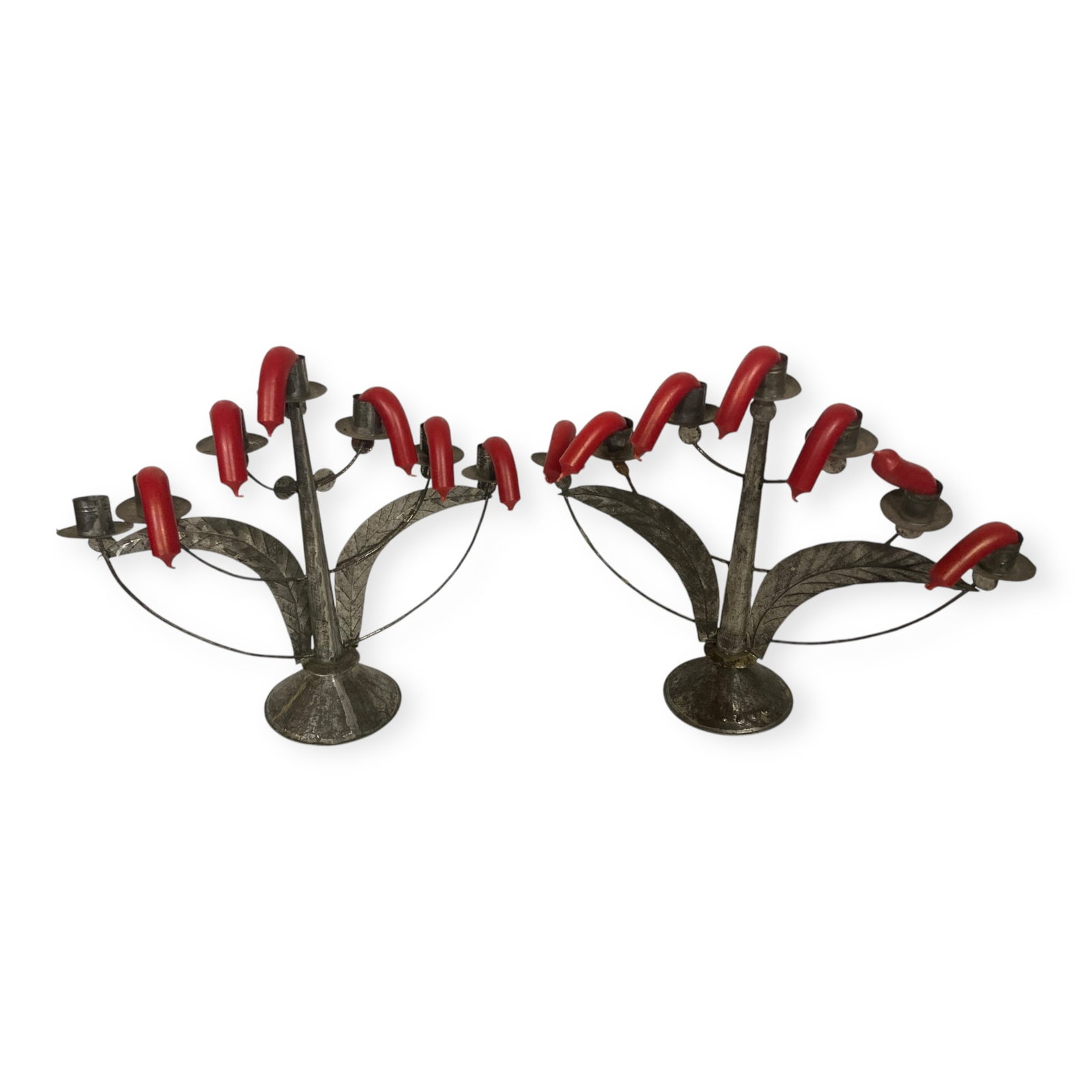 Pair of Tin Candelabros, Marked On Bottom: A pair of 7 candle tin candle operas. 12 1/2 tall by 15 1/2 wide. Excellent condition, complete with melted candles !