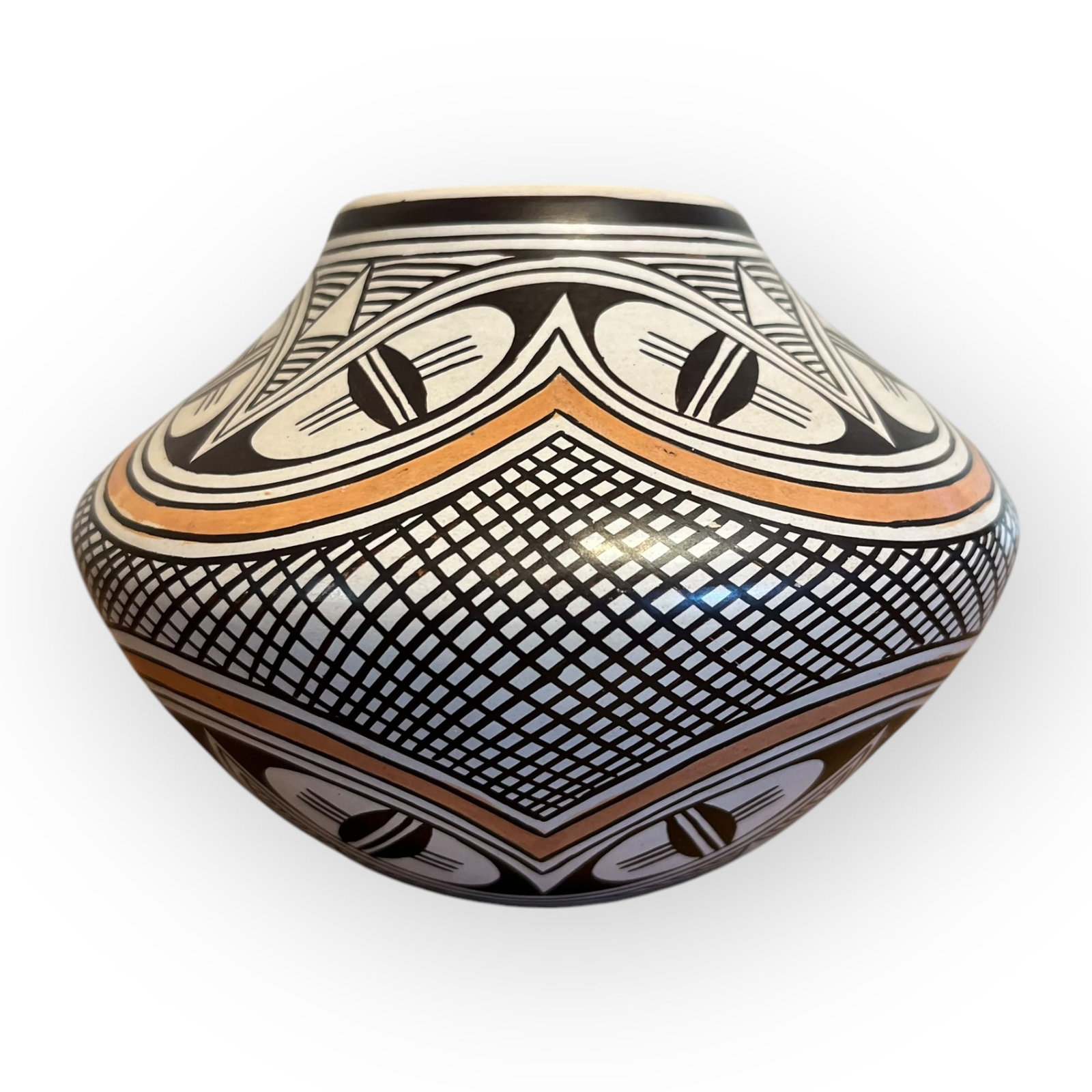Hopi-Tewa Polychrome Vase by Feather Woman (Helen Naha, 1922-1993): An exceptional vase/seed jar by Helen Naha (Feather Woman). The bottom is signed with her distinctive Feather Signature. Measures 4 inches tall x 6 inches in diameter. Good condition with no cracks or