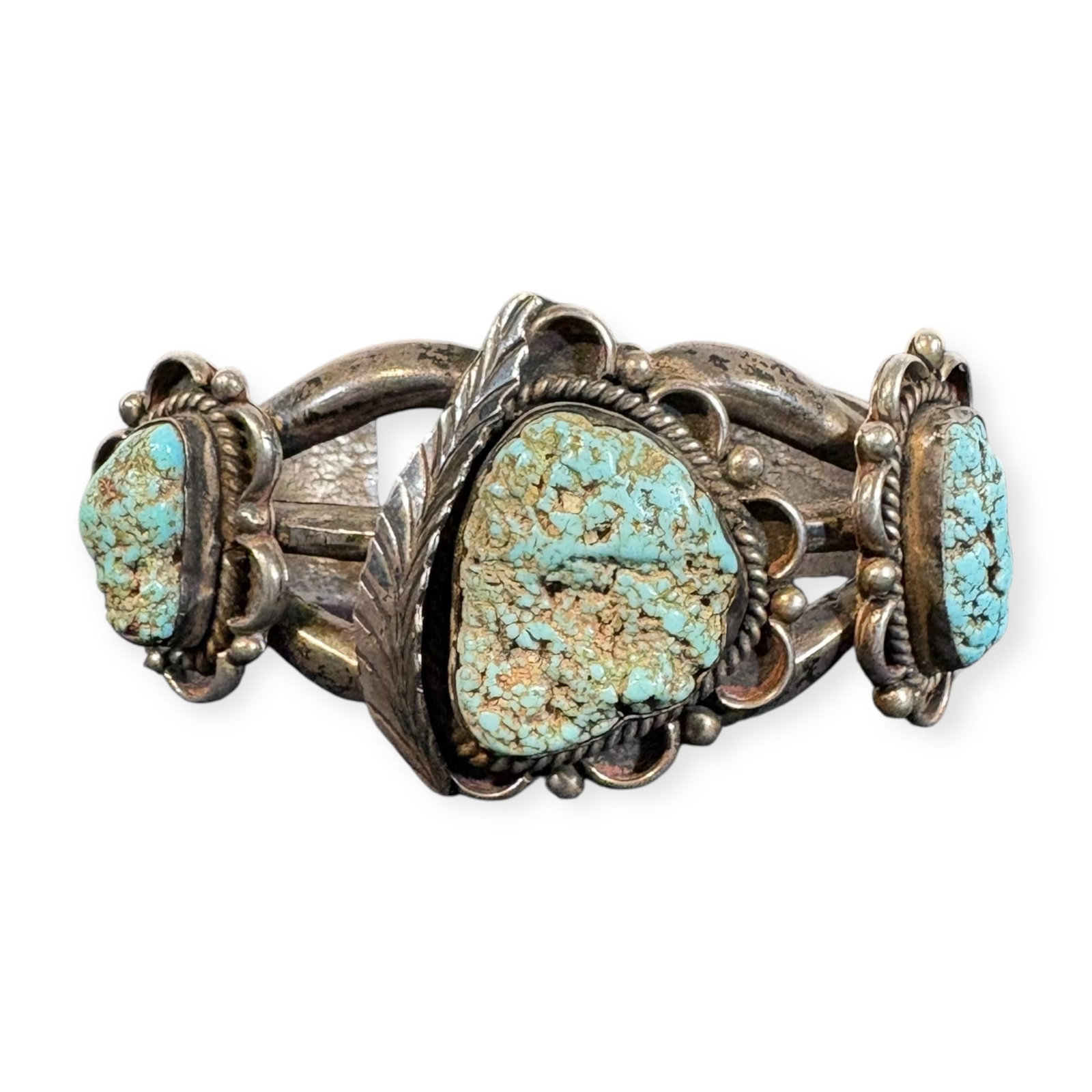 Heavy Navajo 3 Stone Turquoise Bracelet Marked HJ: Measures approx 2.5 inches across cuff. Good condition. Marked with hallmark HJ.