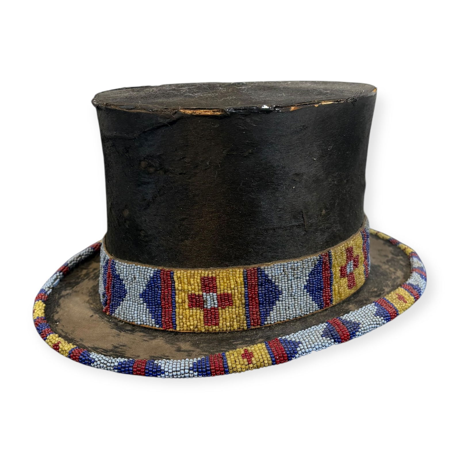Beaded Beaver Skin Top Hot: Measuring approx 11.5 inches x 6 inches tall. Surviving in very good condition with some age expected wear and cracks to the hats edges. The hat is marked SINCLAIR & CO/LONDON and features a beaded ha