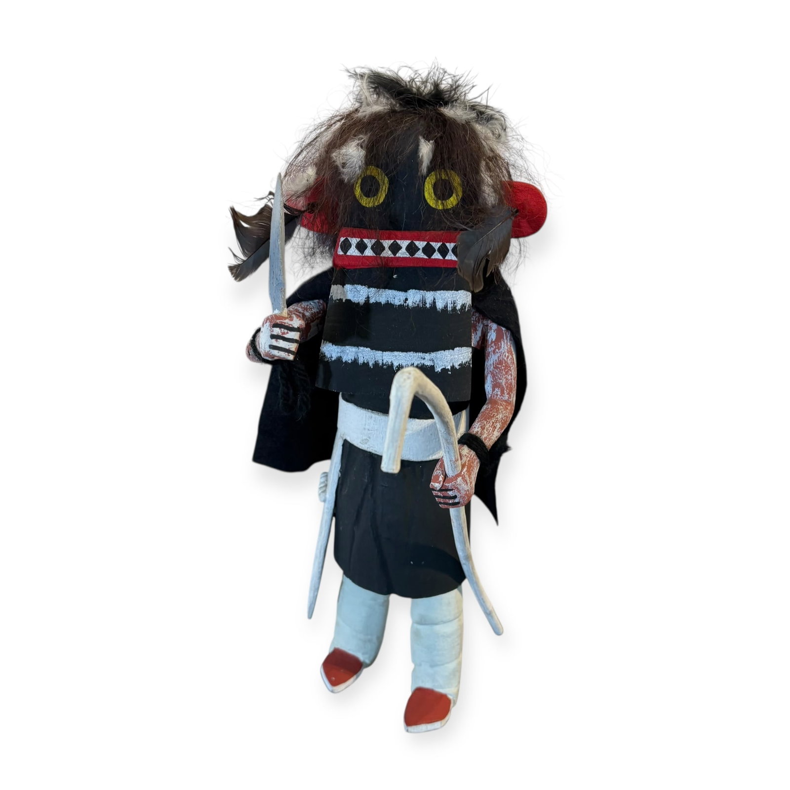 Vintage Black Ogre Hopi Kachina Doll: Measuring approx 11 inches tall. Constructed from cottonwood root, decorated with a feathered crown and carved ceremonial staff. In excellent overall condition.