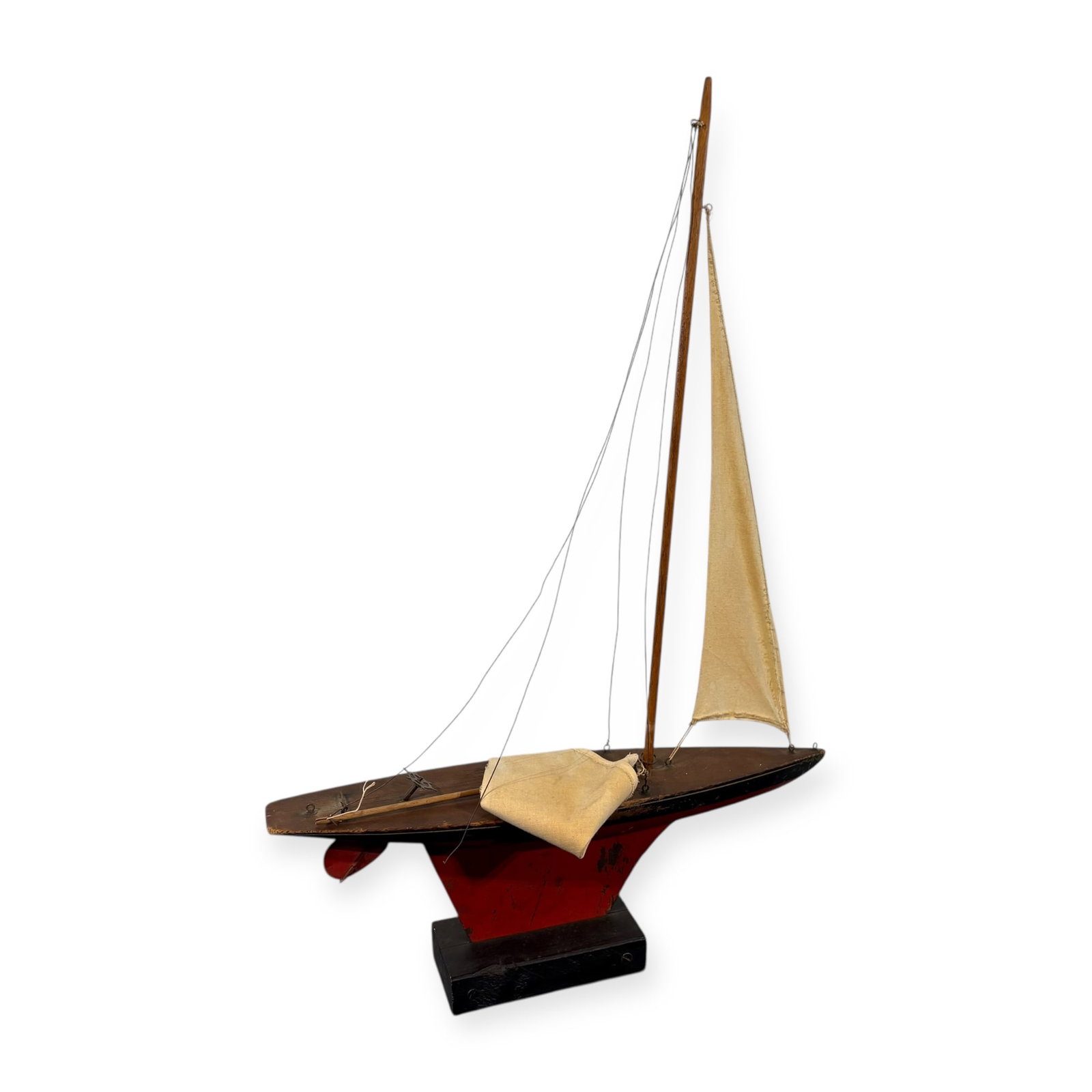 Jacrim Hollow-Boat Pond Sailboat: A Jacrim Model pond sailboat on stand. Boat is 20 inches long and 29 inches tall to top of sails. Very nice condition