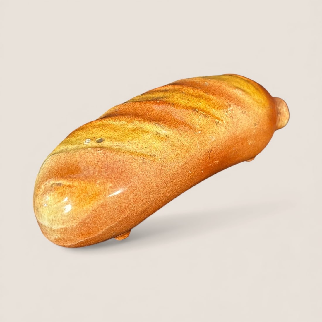 19th Loaf Of Bread Flask: Early Majolica loaf of bread flask. 6 1/2 inch. Excellent condition