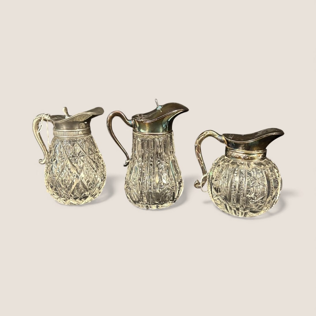 3 Pattern Glass Syrup Dispensers: 3 pattern glass syrup dispensers with silverplate tops. 4 1/2 to 3 1/2 inch tall. All excellent condition