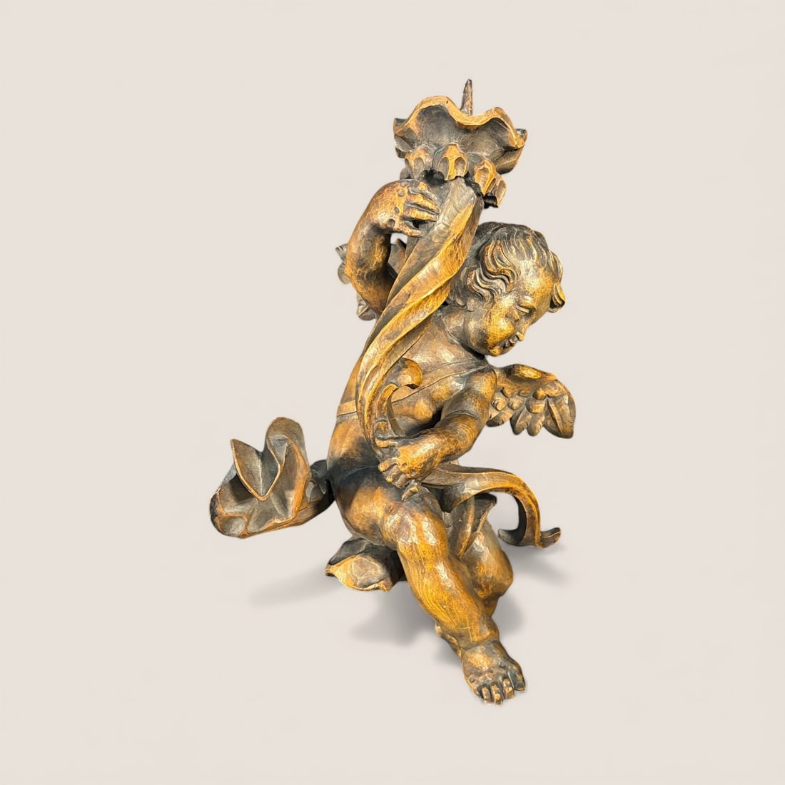 Carved Wood Italian Cherub Figurine: Fancy carved wood cherub figurine. 19 inches tall. Excellent condition
