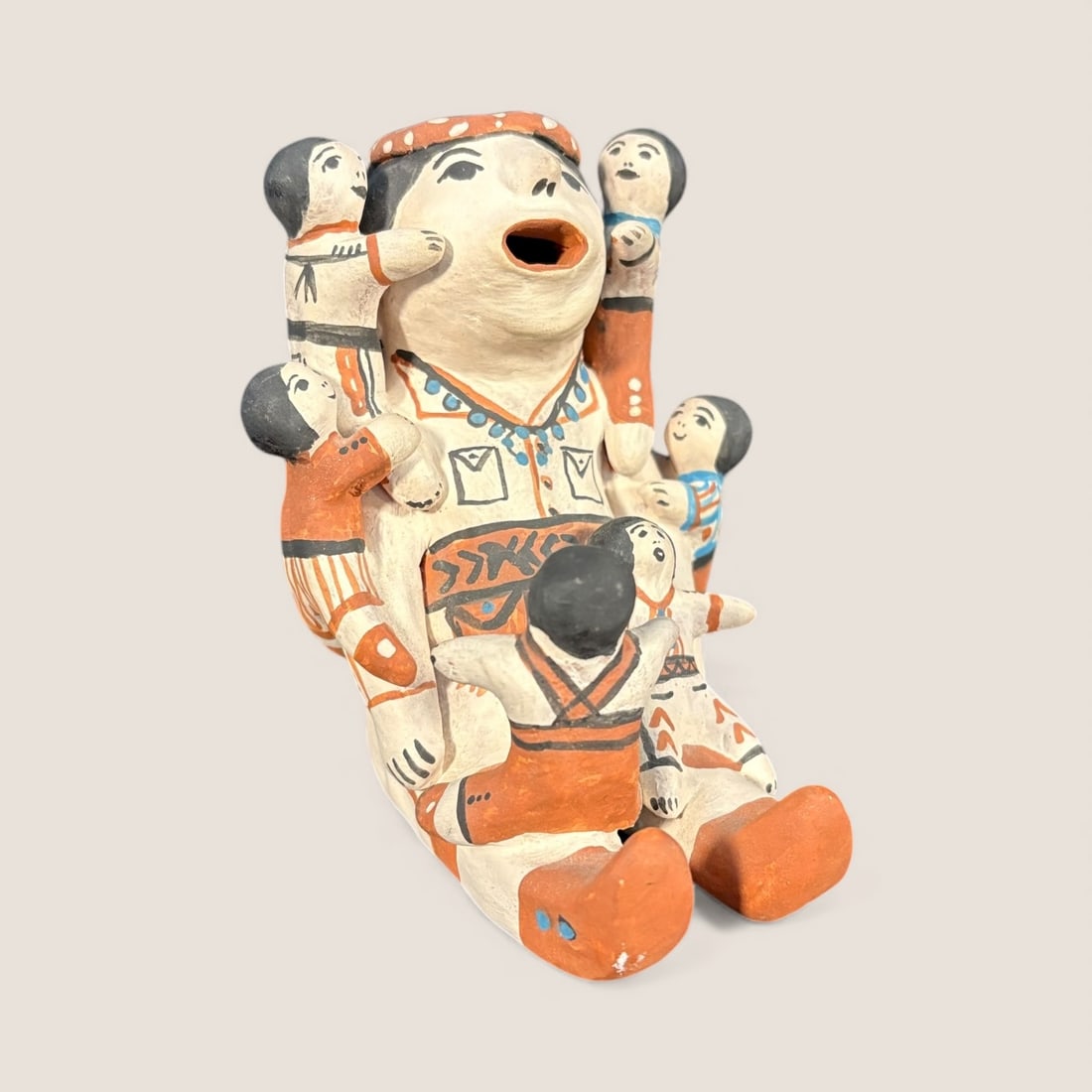 Cochiti Storyteller Doll By Josie: A signed 5 inch Cochiti storyteller doll made by "Josie". Signed and dated 85. Excellent condition