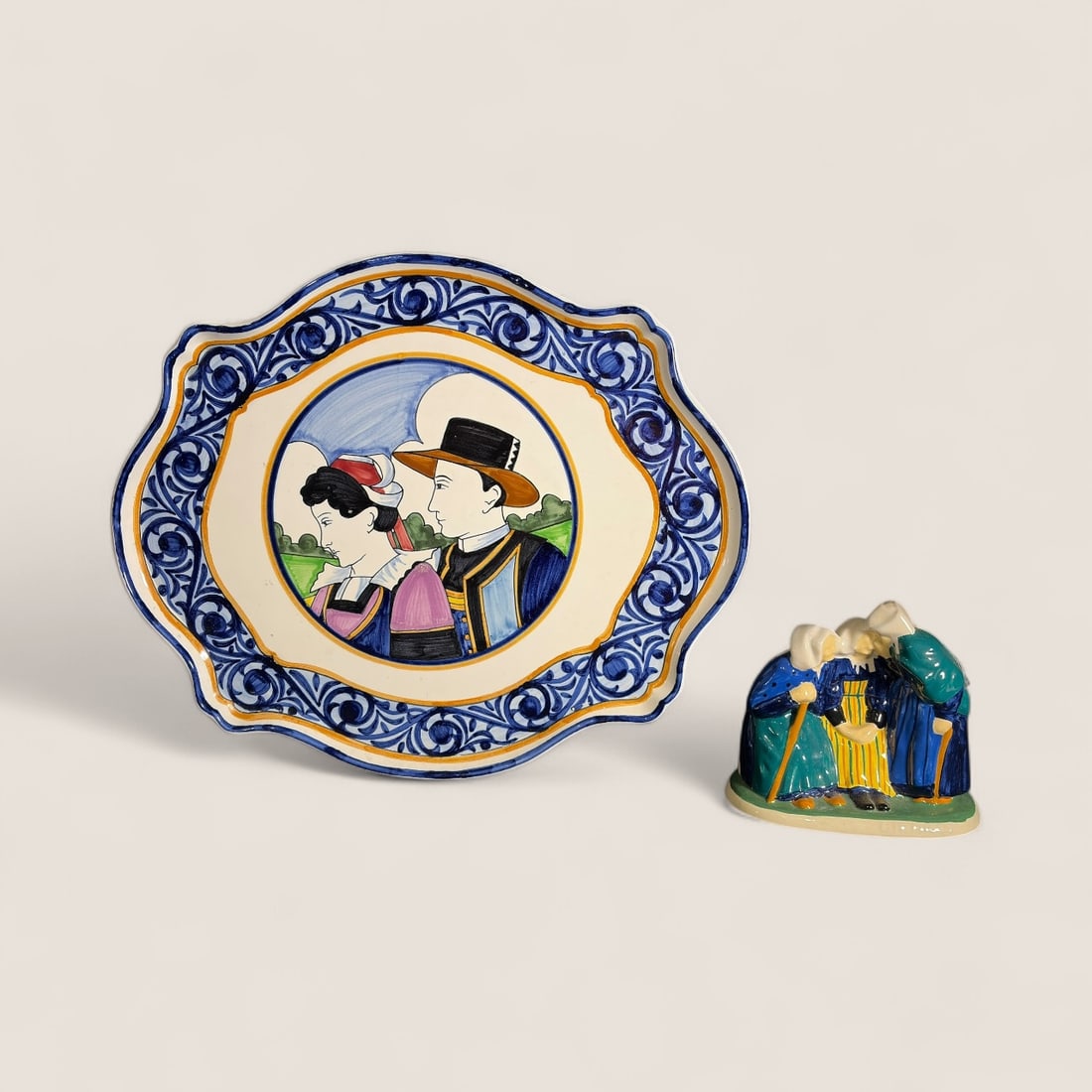 Large Quimper Platter & Quimper Figurine: A 20th century Quimper platter [16 1/2 x 14 ] and a Quimper figurine. Both good