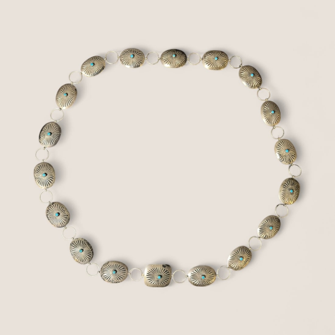 Petite Navajo Concho Belt: This concho has petite style and measures 35 inches in length.