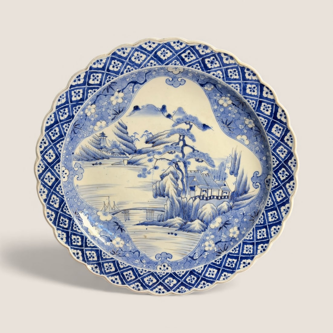 Antique Huge Japanese Imari Charger: A 19 inch Japanese Imari charger in blue&white. Excellent original condition Ziebarth's is pleased to offer in-house shipping on all items purchased in our auctions. You can arrange for in-house shipp