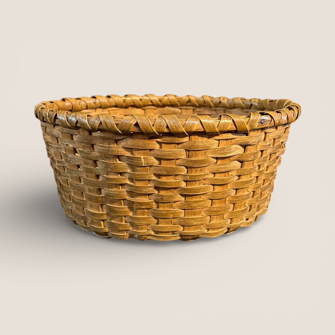 Round Shallow Oak Splint Basket: Measures approx 9 x 4 inches, great patina. To bid with us directly, please visit Ziebarths.com (18% buyers premium). We offer affordable, in-house shipping on all lots in the auction. If you have any