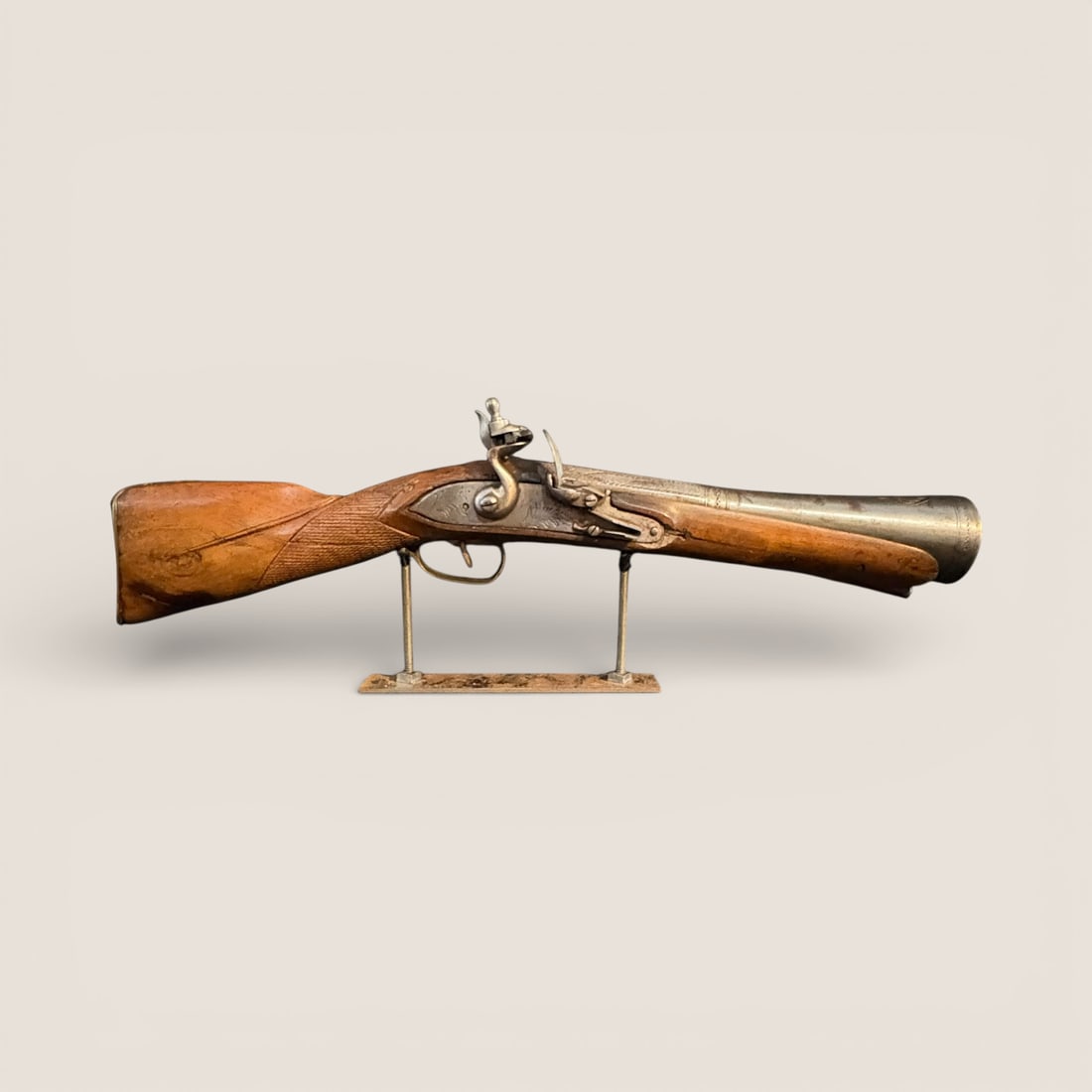 Flintlock Blunderbuss Pistol: Circa 1775-1820 Engraved Blunderbuss Pistol. Checkered stock. Appears complete. Hammer does not lock in place when pulled back. 19 1/3 inches long To bid with us directly, please visit Ziebarths.com (