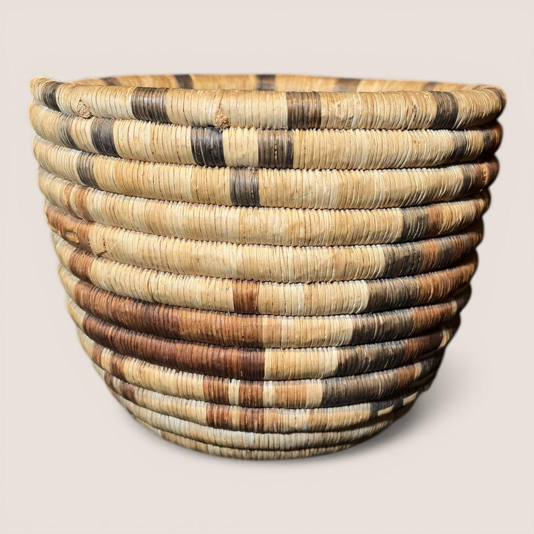 Figural Hopi Coil Basket: With figures of deer, measuring approx 6 inches tall x 7.5 inches in diameter. A fine example To bid with us directly, please visit Ziebarths.com (18% buyers premium). We offer affordable, in-house