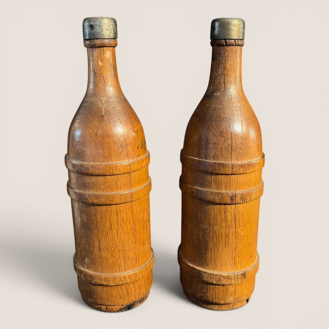 A Pair of Vintage Oak Wood Salt and Pepper Shakers in the Form of Whiskey Bottles (1 of 1)