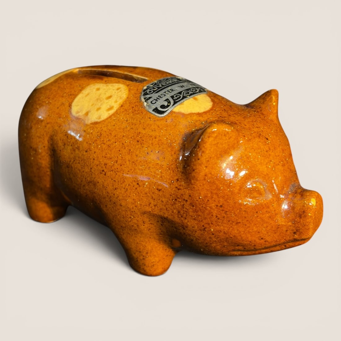 American Rockingham Glazed Pottery Piggy Bank with Chester West Virginia Souvenir Label (1 of 1)