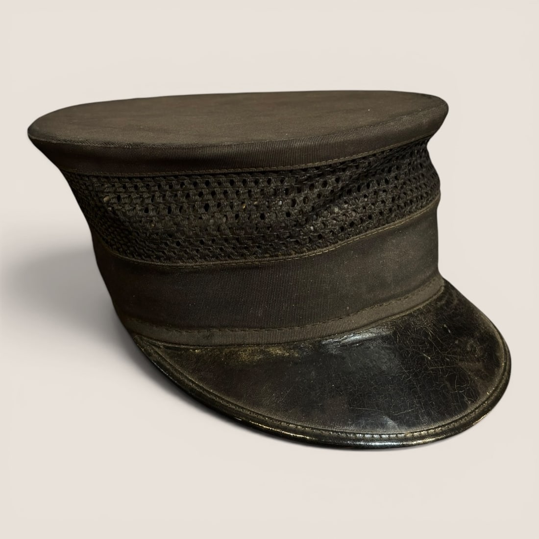 A. G. Meier and Co. Chicago Ventilated Summer Uniform Cap: This is a vintage mid-20th-century American uniform peaked cap, commonly utilized by railroad conductors, postal workers, or municipal transit employees for summer service. The item was manufactured b