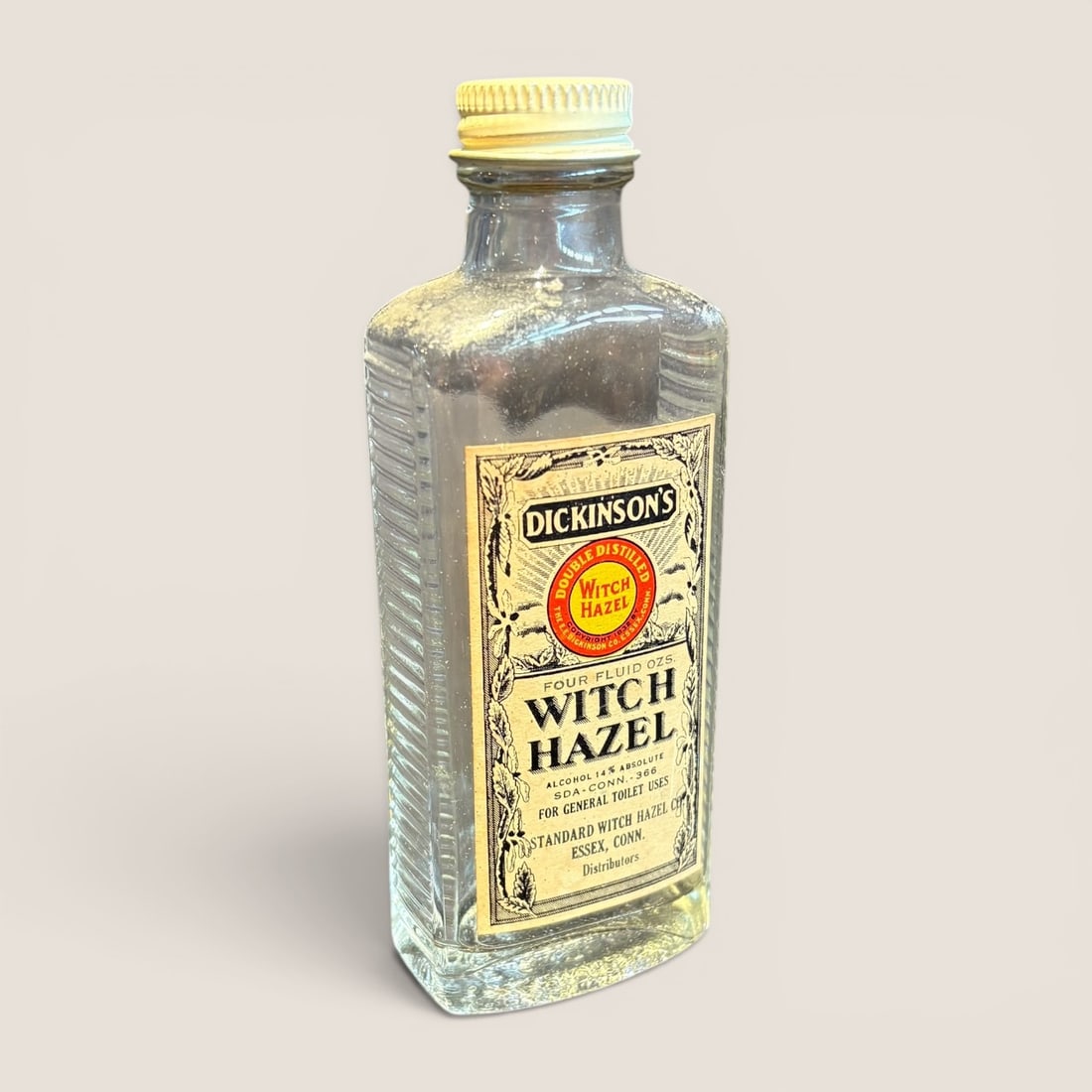 Vintage Dickinson's 4 Fluid Ounce Glass Witch Hazel Bottle (1 of 2)