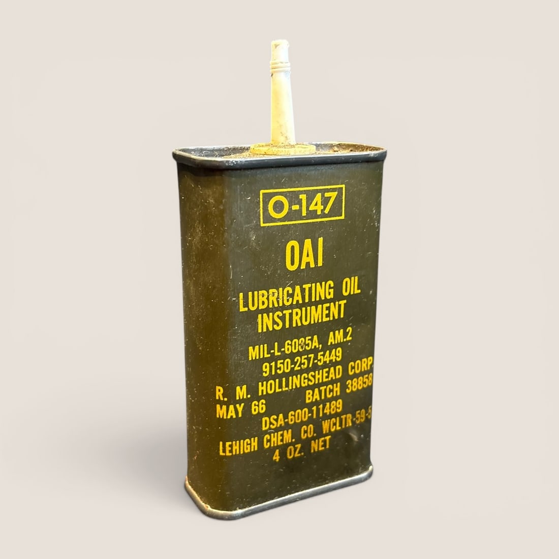 Vintage Vietnam War US Military O-147 OAI Lubricating Oil Instrument Can dated May 1966: A vintage United States military maintenance supply item, specifically a 4-ounce can of O-147 OAI instrument lubricating oil. The rectangular metal container is finished in traditional military olive 