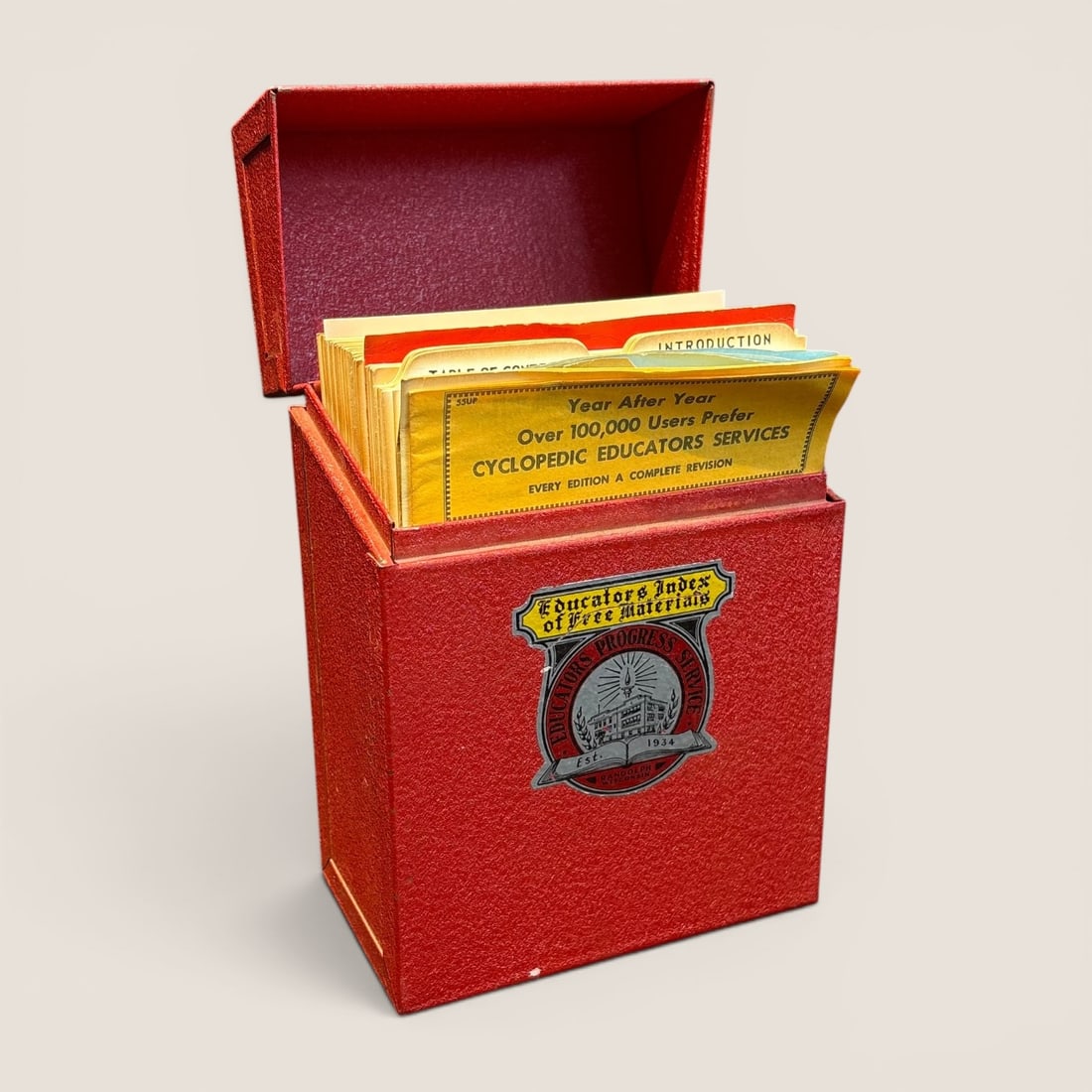 Educators Progress Service. Educators Index of Free Materials. Educators Progress Service, c. 1950s.: A vintage Educators Index of Free Materials resource file box produced by Educators Progress Service of Randolph, Wisconsin. The collection is housed in a vertical, hinged, red pebble-textured steel