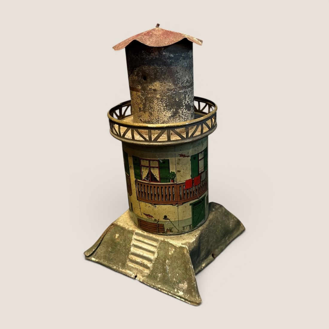 German Tin Lithographed Lighthouse Steam Accessory, Attributed to Georges Carette and Cie: A lithographed tinplate lighthouse, typically produced as a scenic accessory for live steam engines or model train layouts. This item is attributed to the German manufacturer Georges Carette and Cie, 