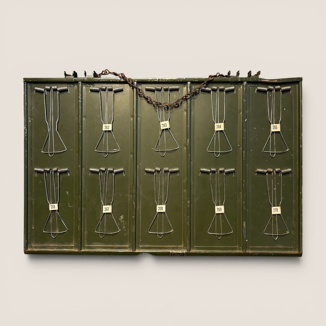 Vintage Industrial Metal Receipt Holder with Numbered Spring Clips: This is an industrial or institutional metal receipt holder, designed for use in an accounting or filing system. The unit is constructed from a heavy-gauge steel panel with a dark olive drab green pai