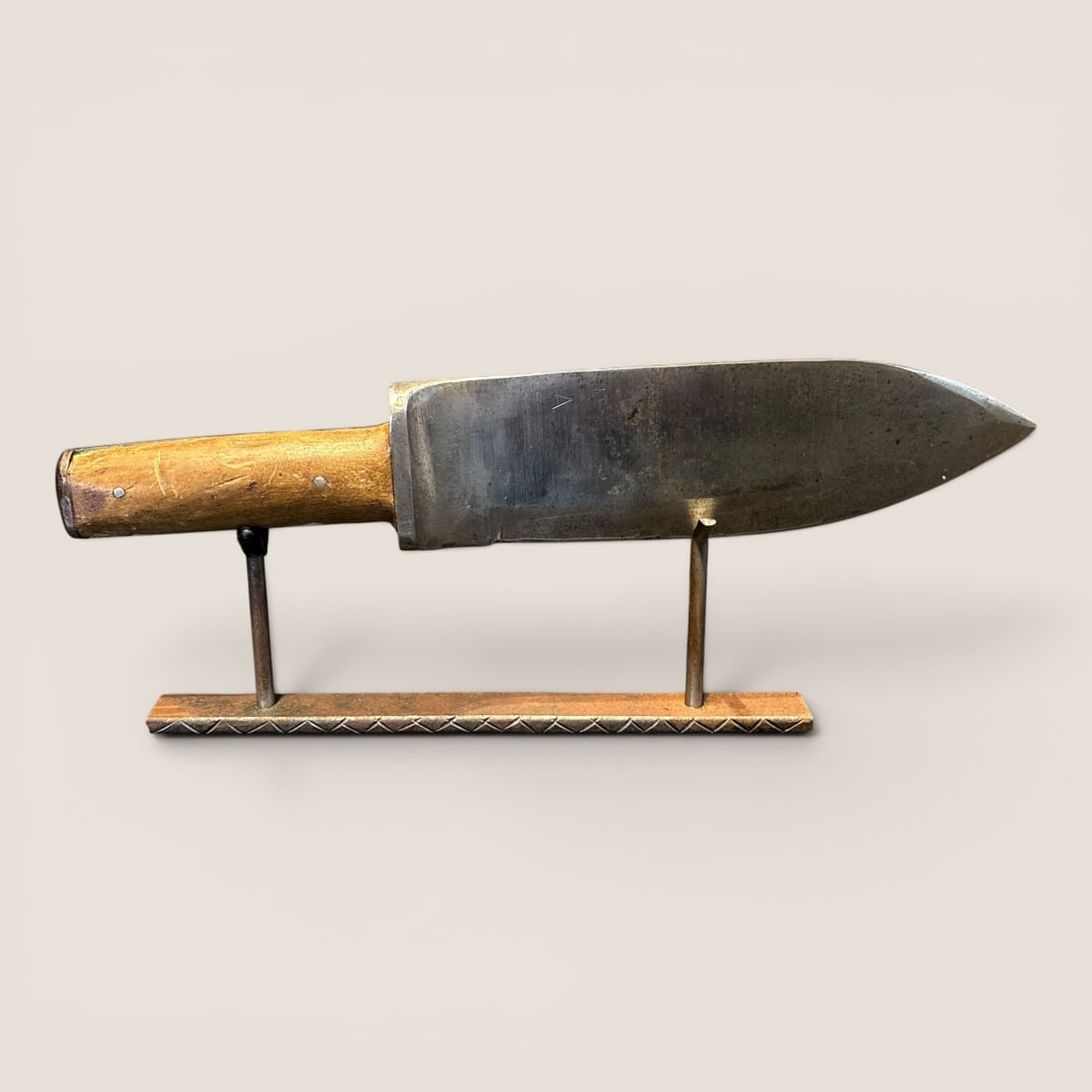 Large Antique Military Knife: Exceptional large blade, wooden handle. The knife measures approx 12.5 inches in length with a blade that measures approx 2.5 inches in width.We provide in-house shipping on all items in the auction. 