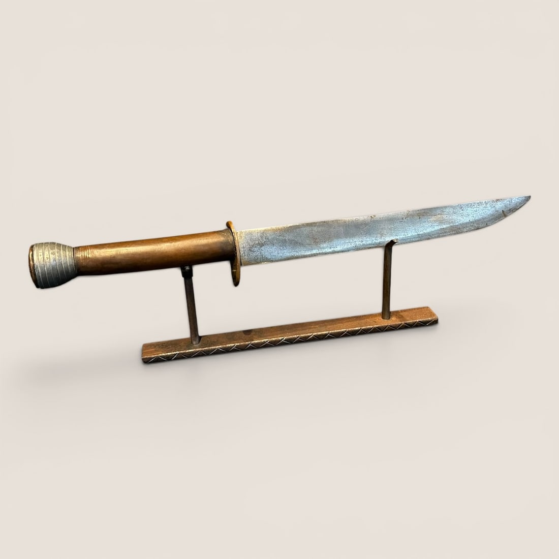 Coat Button Capped Theater Knife: WWI era knife measuring approx 15 inches in length with a coat button to handle end.We provide in-house shipping on all items in the auction. Bid directly at Bid.Ziebarths.com for a lower buyers