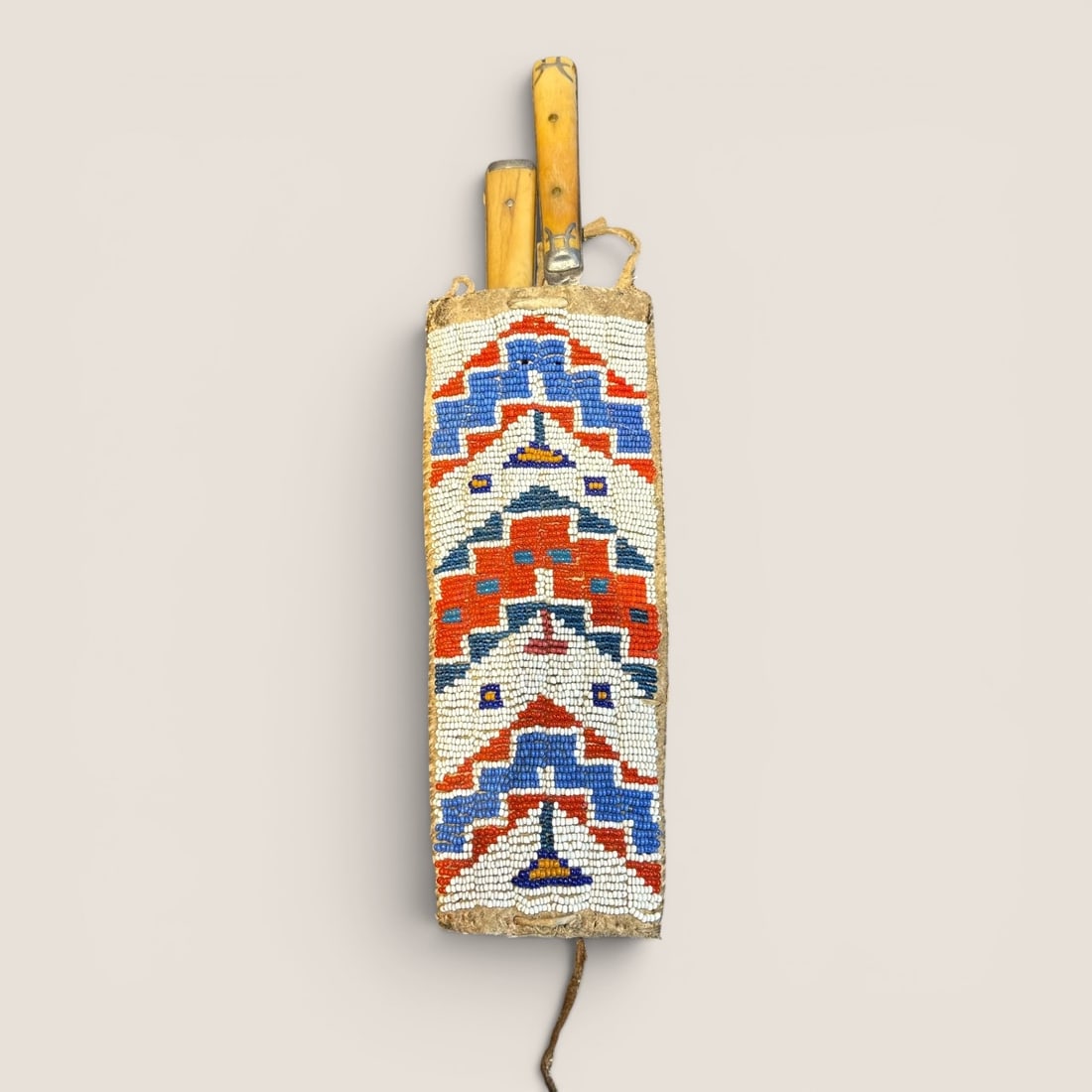 Rare Plains Beaded Knife & Fork Sheath: Beaded panel measuring approx 8 x 3 inches.We provide in-house shipping on all items in the auction. Bid directly at Bid.Ziebarths.com for a lower buyers premium (18%).