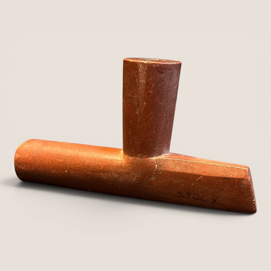 Large Catlinite T-Pipe Bowl: Measures 6.5 x 3.5 inches, catlinite. Good condition.We provide in-house shipping on all items in the auction. Bid directly at Bid.Ziebarths.com for a lower buyers premium (18%).
