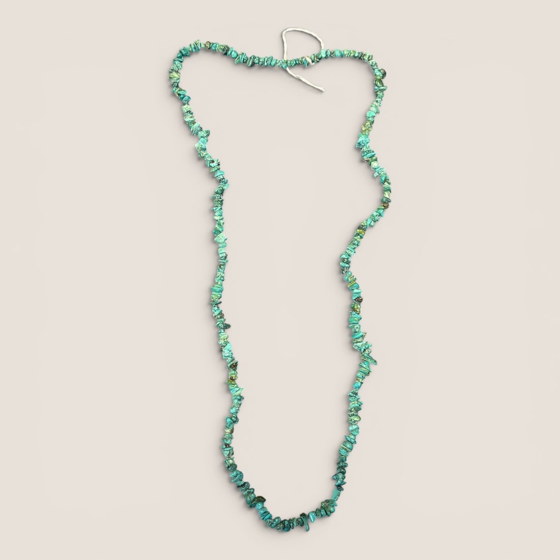 Turquoise Strand Necklace: 32 inches overall length. We provide in-house shipping on all items in the auction. Bid directly at Bid.Ziebarths.com for a lower buyers premium (18%).