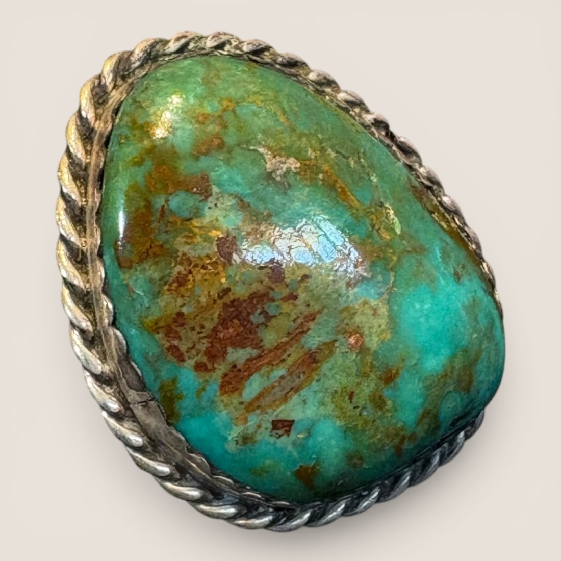 Large Stone Navajo Ring Marked J: Marked J and sterling. Measures approx 3/4 inches.We provide in-house shipping on all items in the auction. Bid directly at Bid.Ziebarths.com for a lower buyers premium (18%).