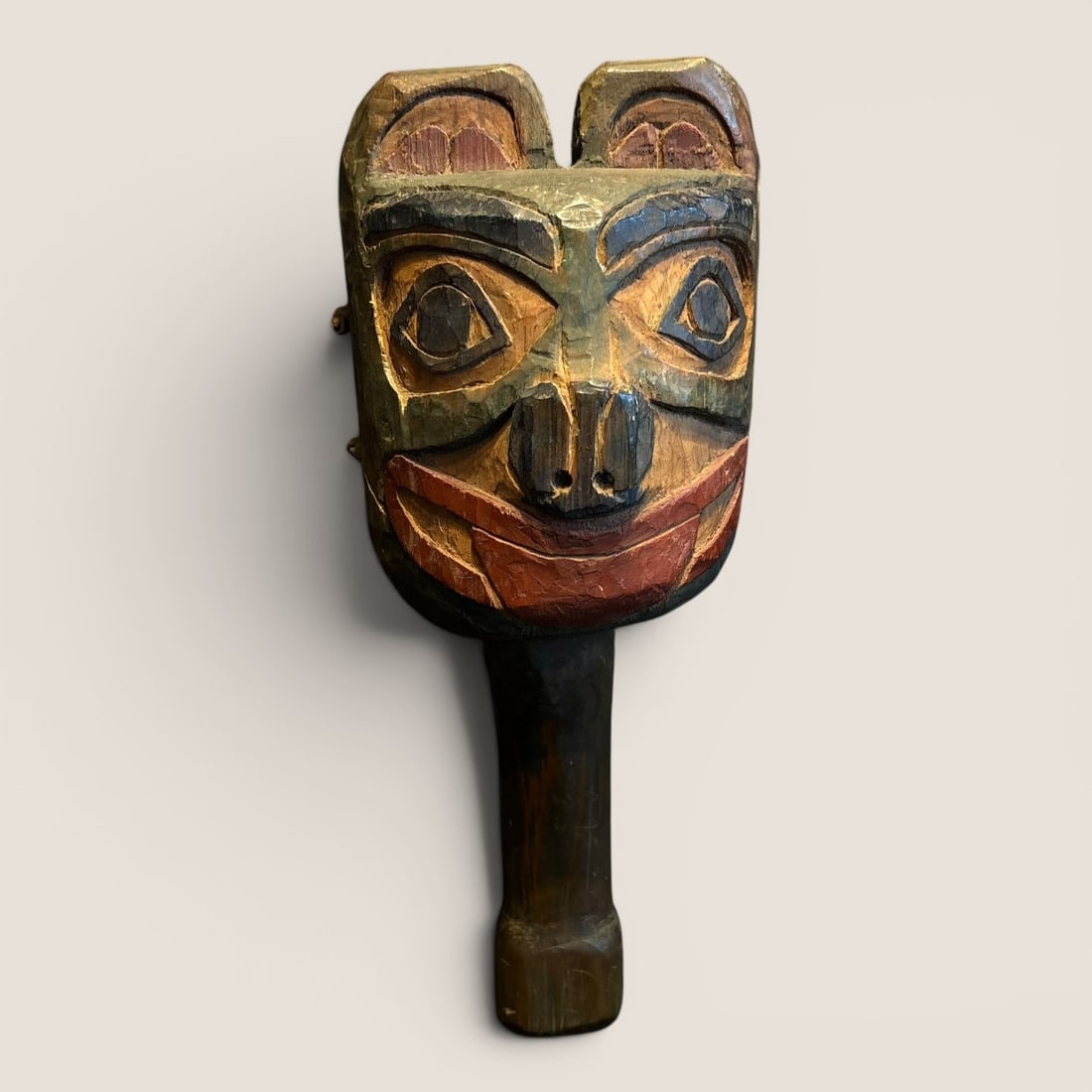 20th C Northwest Coast Carved Rattle: Measures approx 11 inches tall.We provide in-house shipping on all items in the auction. Bid directly at Bid.Ziebarths.com for a lower buyers premium (18%).
